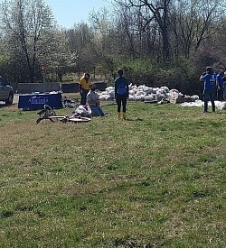 River Keeper leader with Mission Continues DC Platoon. Yes! that's a Ride share bike and some of the trash taken out of the river